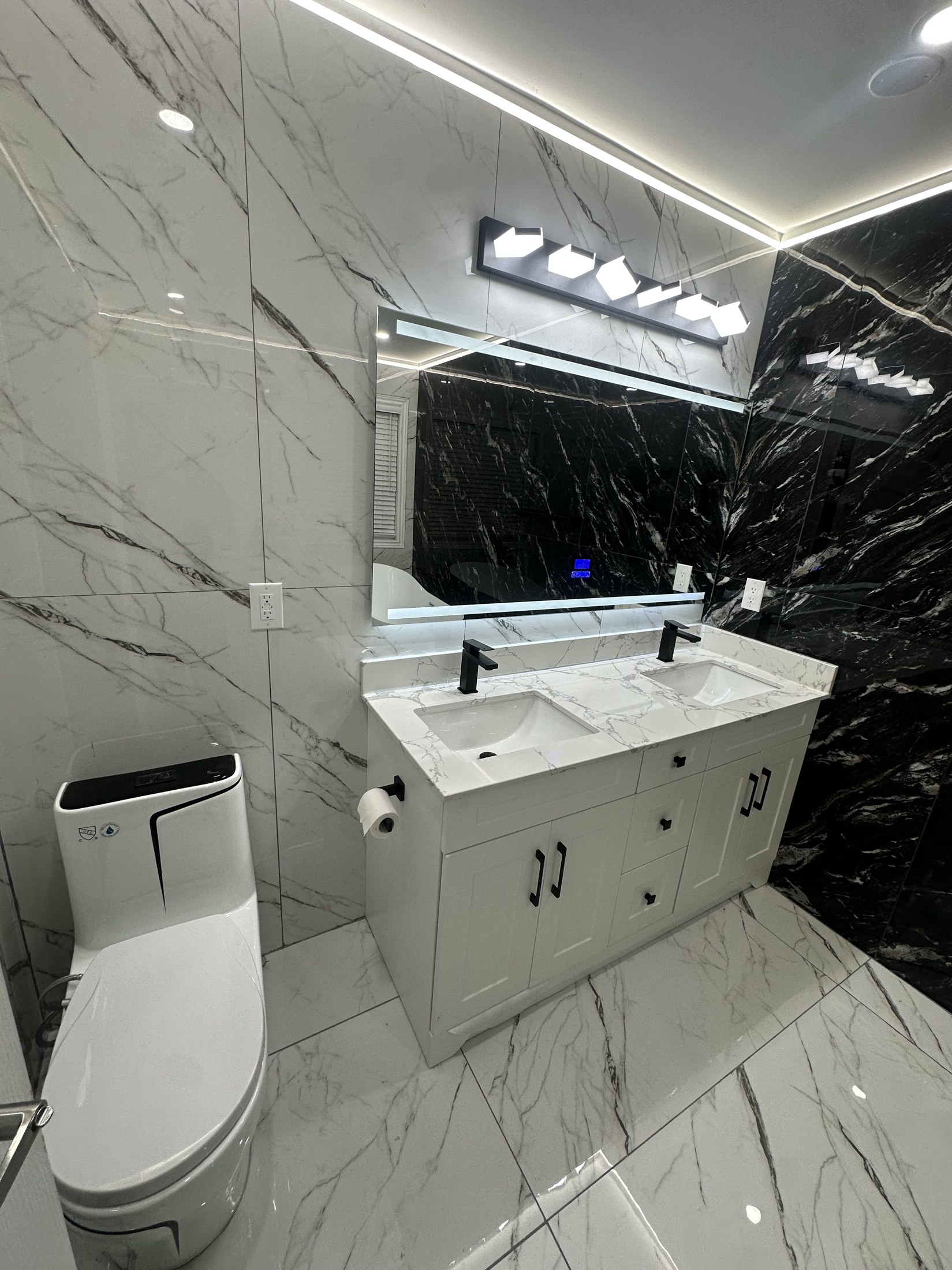 Double Vanity & Porcelain Marble Walls — Renovations project by Redstone Construction in Brampton, ON